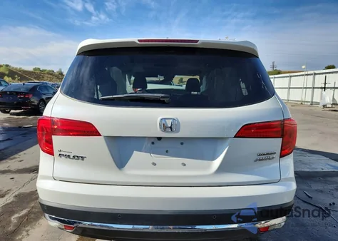 2018 Honda Pilot Touring z USA, uszkodzony, nr VIN 5FNYF6H92JB059822